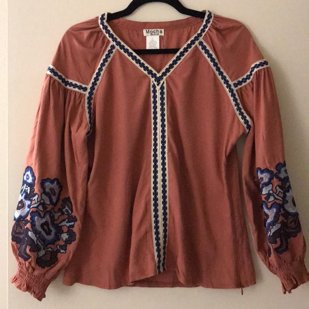 Burnt orange blouse with puff detailed sleeves